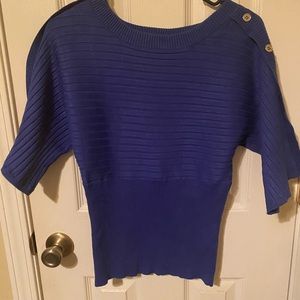 A classy looking blue knit top in good condition.